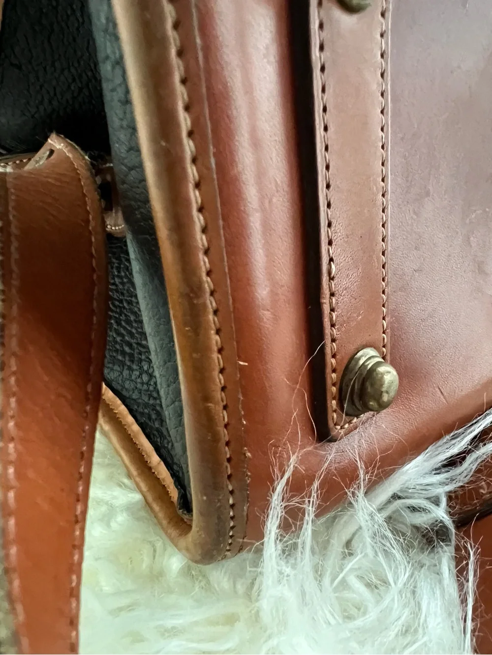 Dooney & Bourke VINTAGE black pebbled Leather satchel with British tan trim.